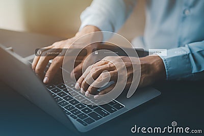 An individual is typing on a keyboard laptop showing a hologram interface to a member login, a businessman is going to access the Stock Photo