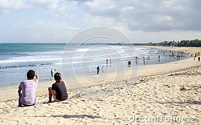 Lifestyle image of couple enjoys day at the beach Editorial Stock Photo