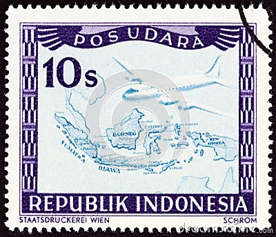 INDONESIA - CIRCA 1947: A stamp printed in Indonesia shows aircraft and map of Indonesia, circa 1947. Editorial Stock Photo