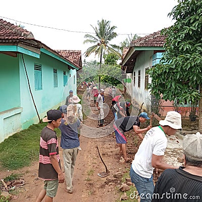 Indonesia. Lampung: Local residents are working together to clean roads in Sidomulyo Village 10/2020. Editorial Stock Photo