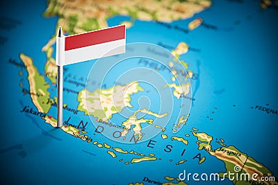 Indonesia marked with a flag on the map Editorial Stock Photo