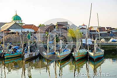 Indonesia traditional boats docking in the pier Editorial Stock Photo