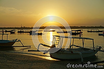 Indonesian fishing boats at sunrise Stock Photo