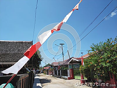 Indonesian flag, red and white. It flutters in every house on independence day. Brave symbol. Stock Photo