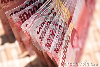Indonesian money, 100,000 IDR banknotes Stock Photo