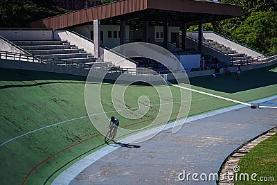 Indonesian paracycling athlete Martin Losu is training to prepare for the next race at the Velodrome Manahan Solo. Editorial Stock Photo