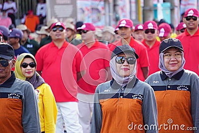 Indonesian participating in marching (baris berbaris) to celebrate Indonesian independence day Editorial Stock Photo