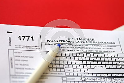 Indonesian tax form 1771 corporate taxpayers annual income tax return with pen Stock Photo