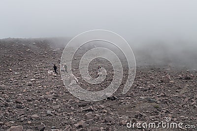Indonesian tourists in the clouds on Vilcano Merapi Editorial Stock Photo