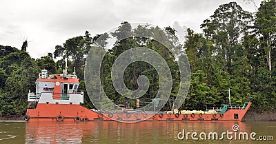 Indonesian traditional merchant ship on the river Editorial Stock Photo