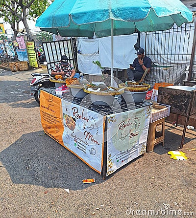 Indonesian traditional snack seller. Editorial Stock Photo