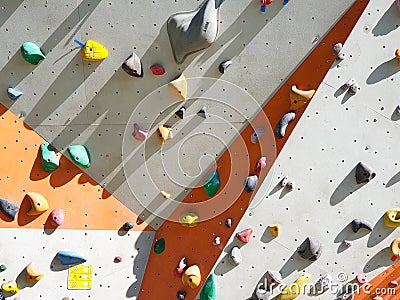 Indoor and outdoor sports climbing stone wall Stock Photo