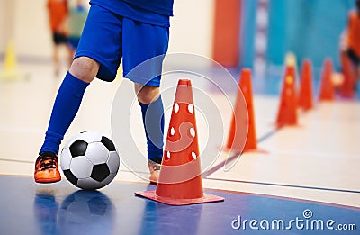 Indoor soccer players training with balls. Indoor soccer sports hall. Indoor football futsal player Stock Photo