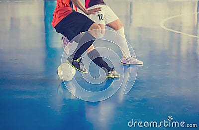 Indoor soccer sports hall. Football futsal player, ball, futsal floor Stock Photo