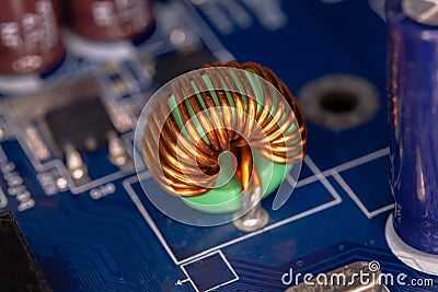 Inductor copper coils on the circuit board Stock Photo