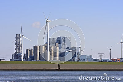 Industrial area and windmills, Groningen, Netherlands Stock Photo