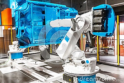 automated robotic arm working in car factory Stock Photo