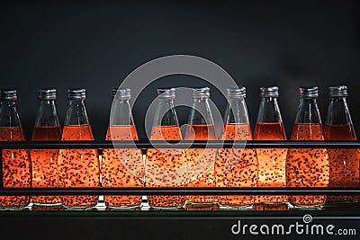 Industrial background of close up beverage in production assembly line Stock Photo