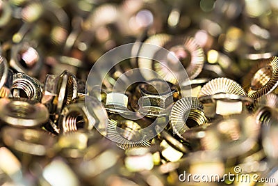 Many bronze hex nuts close Stock Photo