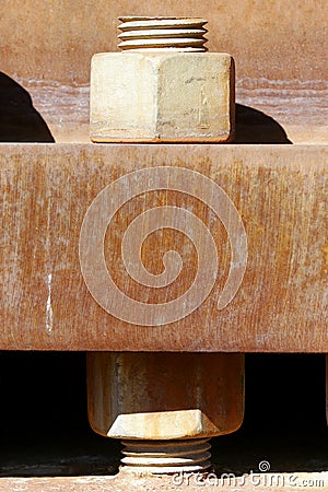 Industrial Bolt Through Rusted Metal Stock Photo