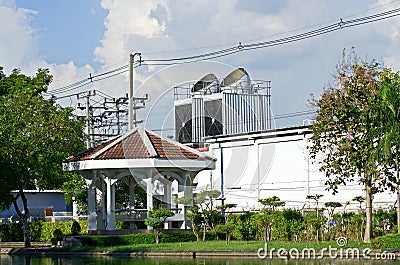 Industrial chimney near Nong Chok public park Stock Photo