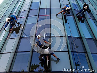Industrial climbers - windows washers Editorial Stock Photo
