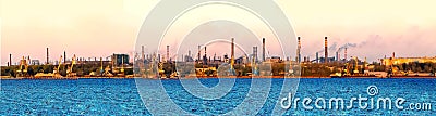 The Industrial complex in Ukraine. Dnieper river and huge pipes of metallurgical plants. Smoke emissions in the atmosphere. Stock Photo