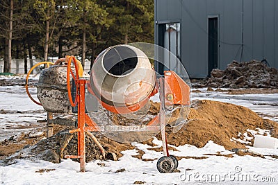 Industrial concrete mixers at construction site Stock Photo