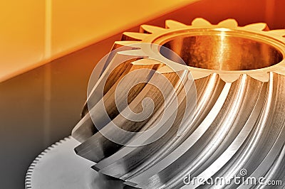 Industrial conical gear with spiral machine teeth. Stock Photo