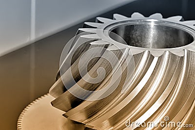 Industrial conical gear with spiral machine teeth. Stock Photo