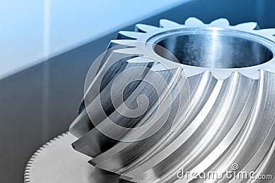 Industrial conical gear with spiral machine teeth. Stock Photo