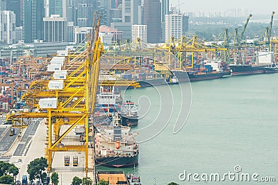 Industrial Container Cargo freight ship with working crane Stock Photo