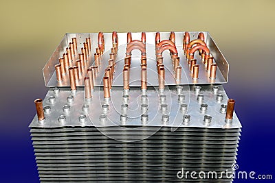 Industrial cooling radiator with metal plates and copper tubes Stock Photo