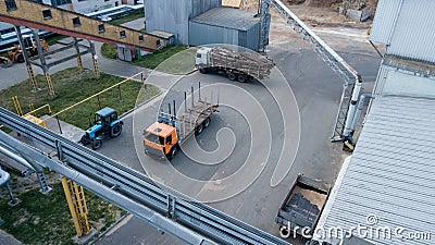 Industrial enterprise top view, truck and tractor Stock Photo