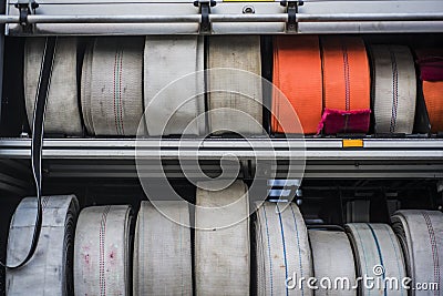 Industrial equipment, fire hoses of various specifications and uses on fire trucks Stock Photo