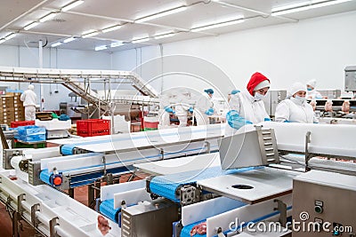 Line packing meat products, meat factory.Food Convenience food Editorial Stock Photo