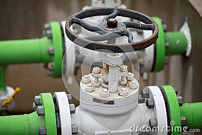 Industrial equipment pipes, manometer/pressure gauge, levers, faucets, indicators in a natural gas compressor station Stock Photo