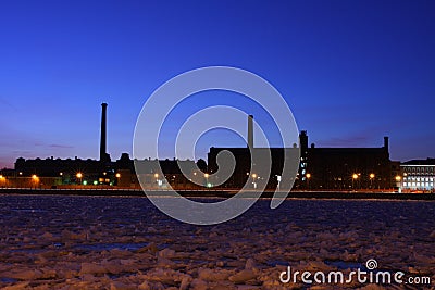 The industrial factories on river bank Neva. Stock Photo