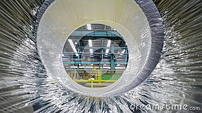 Industrial factory scene through the steel coil Stock Photo