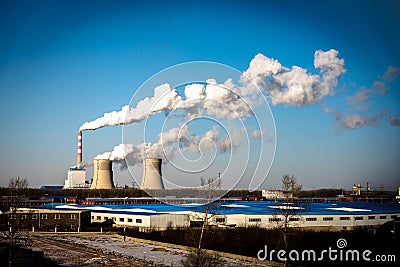 Industrial factory smoke stack of coal power plant from chimney up on sky cause air pollution and destroy the Earth`s atmosphere Stock Photo