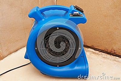 Industrial fan to remove water damage Stock Photo