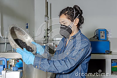 Industrial female worker with protective mask and latex gloves Stock Photo