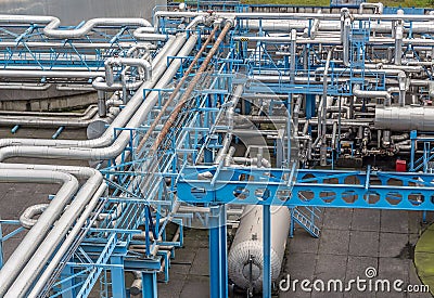 Industrial infrastructure in the factory. Pipes and transmission systems for fuels and technical gases. Stock Photo
