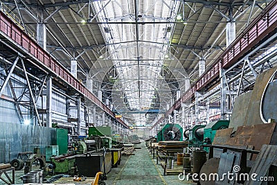 Industrial interior of metalworking factory. Workshop with many machine tools for metal processing, grinding, drilling Stock Photo