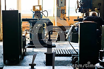 Industrial iron lathe for cutting, turning of billets from metals, wood and other materials, turning, manufacturing of details Stock Photo