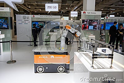 Industrial KUKA robot in booth of Huawei company at CeBIT Editorial Stock Photo