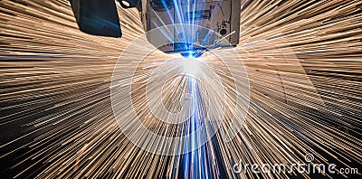 Industrial Laser cutting processing manufacture technology of flat sheet metal steel material with sparks Stock Photo