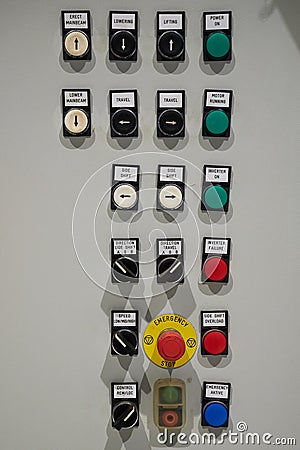 Industrial machine control panel with buttons and signals. center alarm button emergency, stop, side shift, overload, aktive Stock Photo