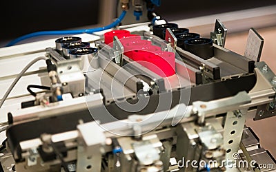 Industrial machine making plastic parts. Complex machinery manufacturing plastic Stock Photo