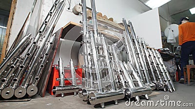 Industrial manufacturing. A storage with iron tube details for construction. Welded constructions. Stock Photo